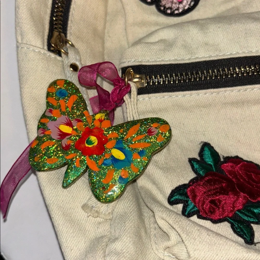ATMOSPHERE BRAND OFF WHITE DENIM BACKPACK WITH BUTTERFLY PATCH DESIGN   PRELOVED